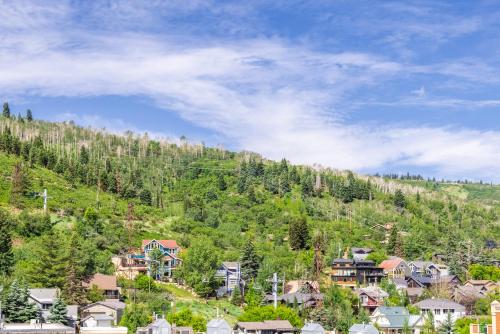 a village on a hill with houses and trees at Main & SKY by EXMAR in Park City
