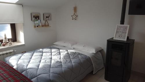 Postel nebo postele na pokoji v ubytování Di Finizio_Cottage