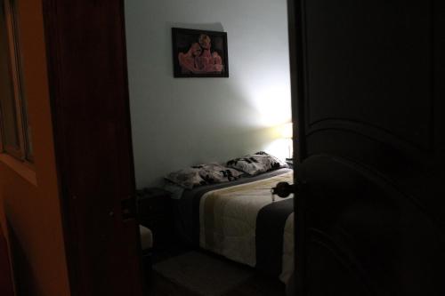 Postel nebo postele na pokoji v ubytování El Leñador hotel y restaurante