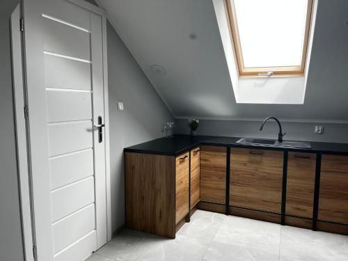 Kuchyň nebo kuchyňský kout v ubytování Beskid Rest Apartments