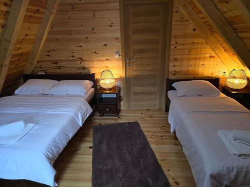 Кровать или кровати в номере Cottage Catherine