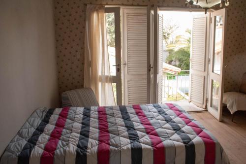 Postel nebo postele na pokoji v ubytování Casa Ita y Nestor