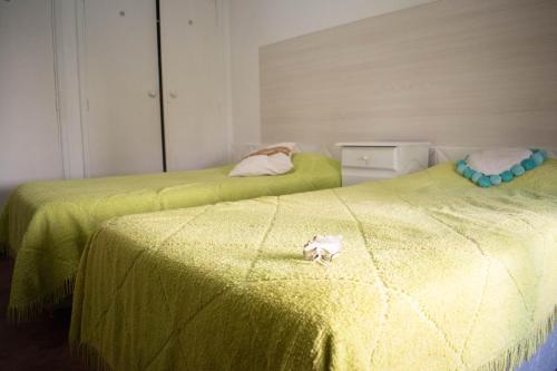 Postel nebo postele na pokoji v ubytování Casa Ita y Nestor