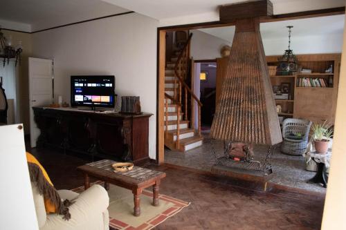 TV a/nebo společenská místnost v ubytování Casa Ita y Nestor