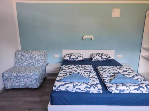 Postel nebo postele na pokoji v ubytování Tilka`s house