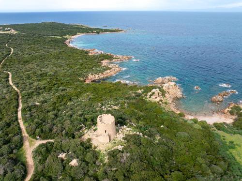 an aerial view of an island in the ocean at Relaxing Residence Baia dei Mirti B4 1 Bedroom Apartment Sleeps 4 -Bilo 4 in Vignola Mare