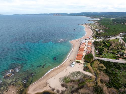 an aerial view of a beach and the ocean at Relaxing Residence Baia dei Mirti B4 1 Bedroom Apartment Sleeps 4 -Bilo 4 in Vignola Mare
