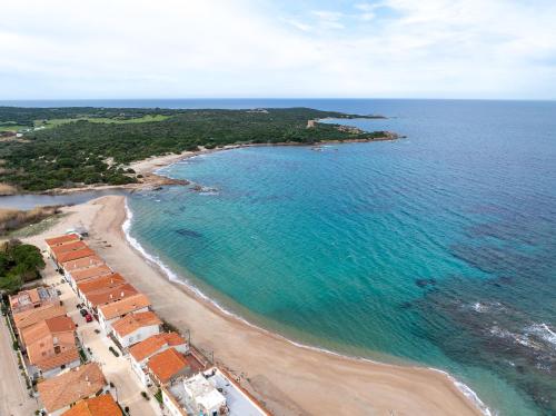 an aerial view of a beach and the ocean at Relaxing Residence Baia dei Mirti B4 1 Bedroom Apartment Sleeps 4 -Bilo 4 in Vignola Mare