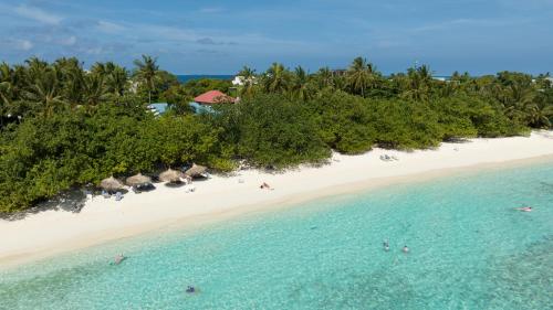 an aerial view of a beach with people in the water at Ostrov Beach in Ukulhas