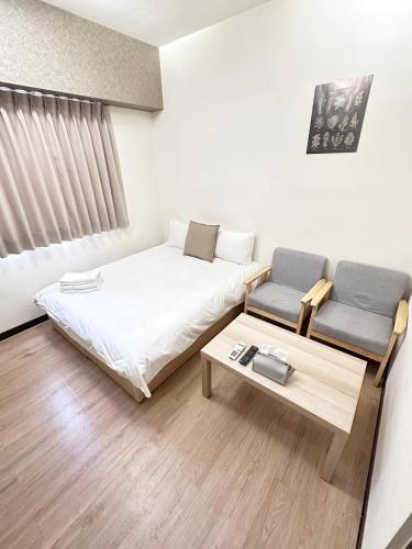 Una cama o camas en una habitación de 理想家