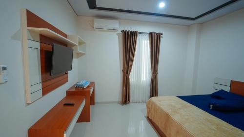 Postel nebo postele na pokoji v ubytování Guest House Sambilegi