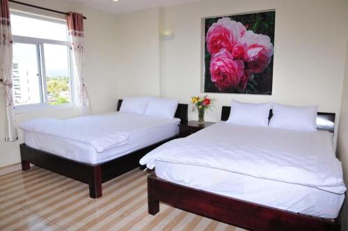 Katil atau katil-katil dalam bilik di Tùng Hương Hotel PQ - by BAY LUXURY