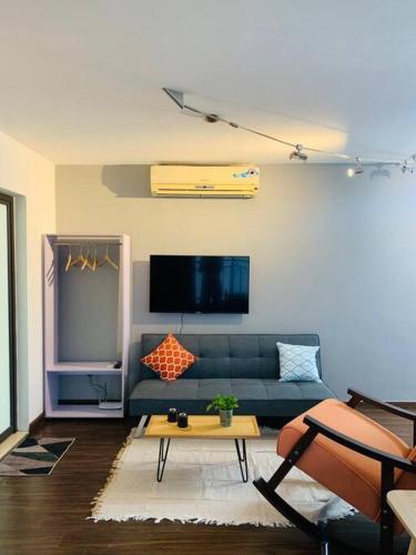 TV/trung tâm giải trí tại Mhouse 127 waterfront 2