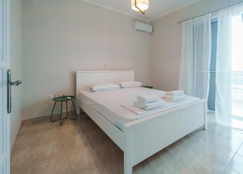 Postel nebo postele na pokoji v ubytování Pantokratoras View