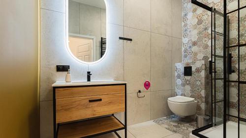 Ένα μπάνιο στο VacationClub - Old Town Apartament 8B