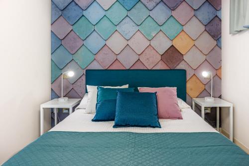 Ένα ή περισσότερα κρεβάτια σε δωμάτιο στο Oleandri Suite Hotel