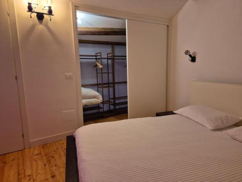 Ένα ή περισσότερα κρεβάτια σε δωμάτιο στο Casa Matteotti