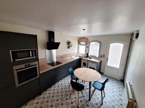 Cuisine ou kitchenette dans l'établissement le Nolaytoît