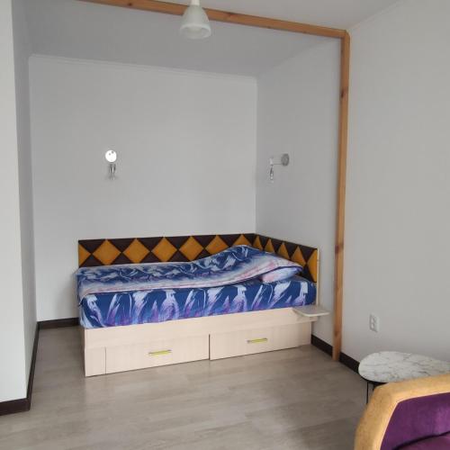 Postel nebo postele na pokoji v ubytování Palladium apartment
