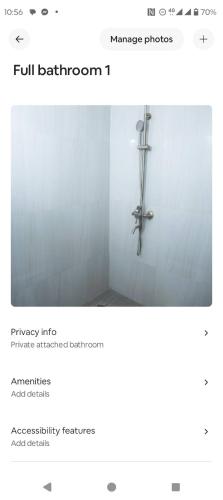 a screenshot of a bathroom with a cross on the wall at Exotic Mimosa Serviced Apartment Accommodation in Lusaka