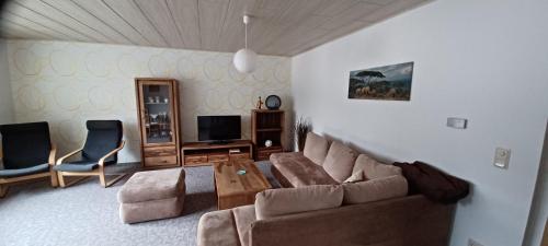 Χώρος καθιστικού στο Ferienwohnung am Rittergut
