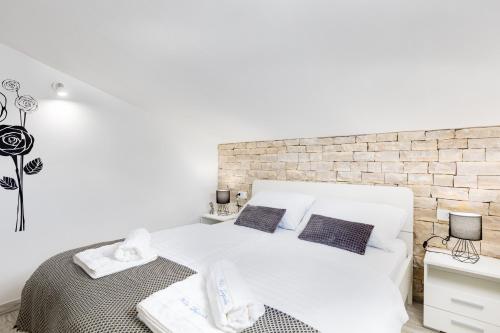 Ένα ή περισσότερα κρεβάτια σε δωμάτιο στο Villa Depicolo