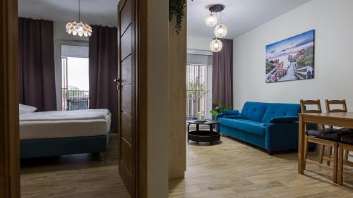 Кровать или кровати в номере VacationClub - Baltic Waves Resort Apartament B308