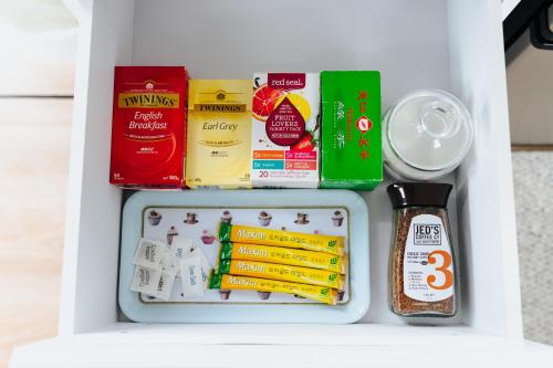 a drawer filled with different types of food at Sweet Hart 1 by Tiny Away in Tamahere