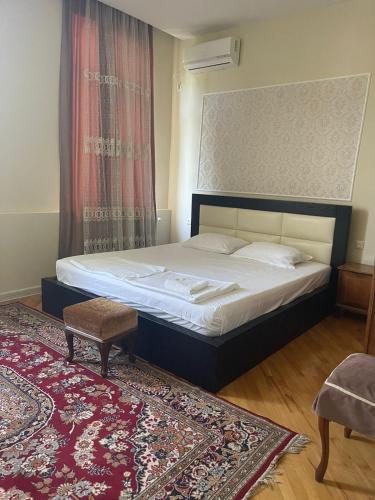 Postel nebo postele na pokoji v ubytování Cozy Stay in Zugdidi