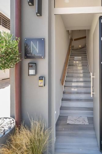 a stairway leading up to a building at Nelia Suite in Lixouri