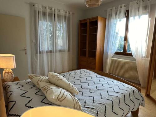Postel nebo postele na pokoji v ubytování Maison périgourdine de charme