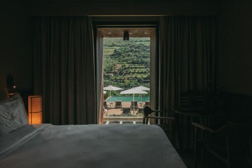 En eller flere senge i et værelse på Torel Quinta da Vacaria - Douro Valley