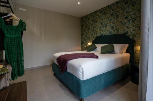 a bedroom with a bed in a room at Virdamuri - Etna Country Resort in Giarre