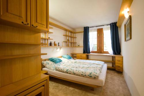 Postel nebo postele na pokoji v ubytování apartmán Králík