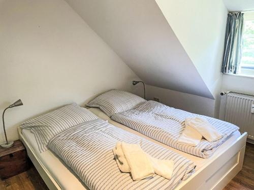 Postel nebo postele na pokoji v ubytování Apartment Laerchenshus by Interhome