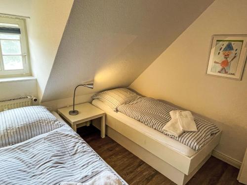 Postel nebo postele na pokoji v ubytování Apartment Laerchenshus by Interhome