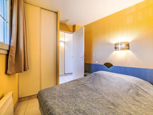 Ένα ή περισσότερα κρεβάτια σε δωμάτιο στο Apartment Les Marines-15 by Interhome