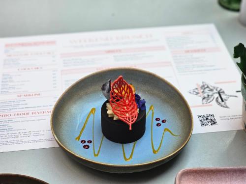 a dessert on a plate on a table at St. James' Court, A Taj Hotel, London in London