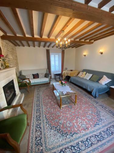 Χώρος καθιστικού στο Le Camp Romain, maison familiale avec terrain