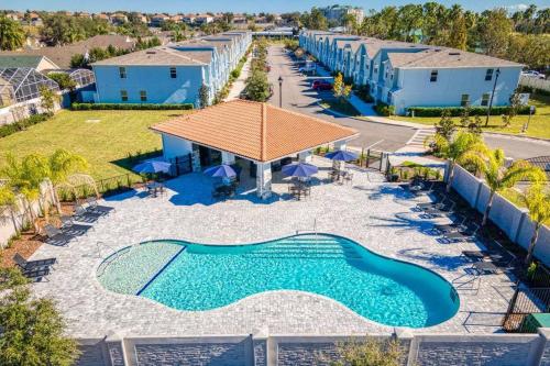 an aerial view of a pool at a resort at 8005 Stunning Villa Disney Park Proximity in Orlando
