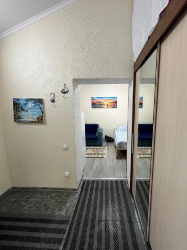 a hallway with a living room and a bedroom at Deluxe Royal Beach in Chok-Tal