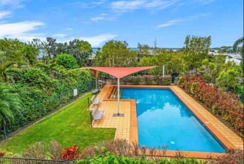 an overhead view of a swimming pool in a yard at Sitting on the Dock of the Bay in Stuart Park