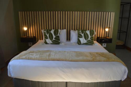 Ένα ή περισσότερα κρεβάτια σε δωμάτιο στο Uitsig Boutique Hotel