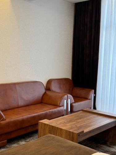 Гостиная зона в Garnet Mir Hotel