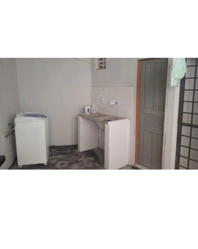 a bathroom with a sink and a toilet in it at Suíte privada com estacionamento in Boa Vista