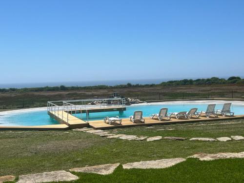 Bazén v ubytování PARAÍSO DA SERVA - Casas Courela da Serva e Flor do Rosto I e II nebo v jeho okolí