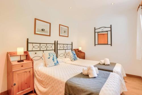 En eller flere senge i et værelse på Villa Ignacio by Villa Plus