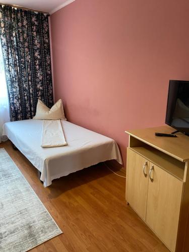Ένα ή περισσότερα κρεβάτια σε δωμάτιο στο Apartament Darya