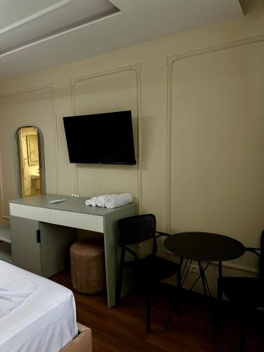 Μια τηλεόραση ή/και κέντρο ψυχαγωγίας στο Sky View Hotel & Restaurant
