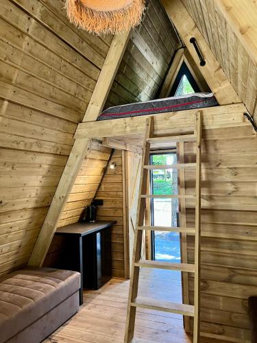 Postel nebo postele na pokoji v ubytování Metropolis CampGlamping